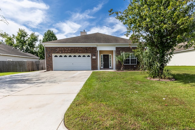 ranch-style house featuring a garage, brick siding, fence, and a front lawn