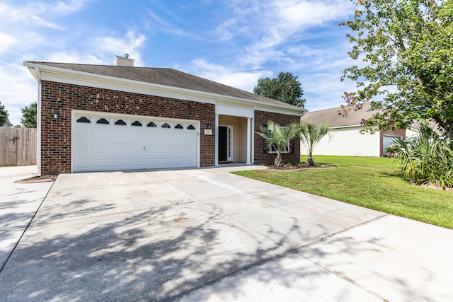 ranch-style home with a garage, a front lawn, concrete driveway, and brick siding