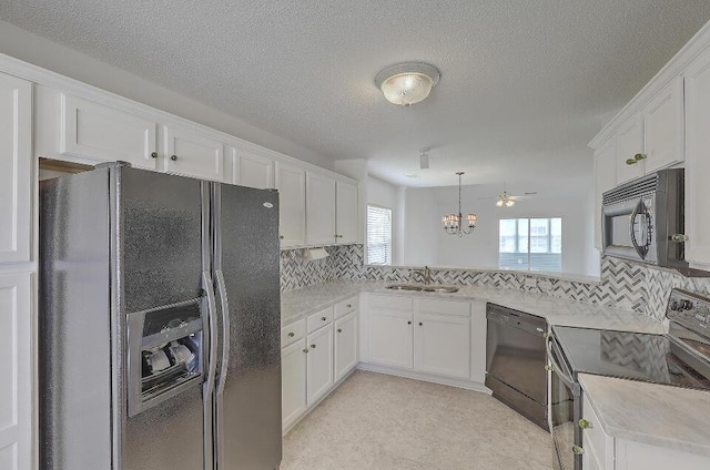 159 Townsend Way, Summerville, SC 29483 - kitchen with black appliances, white cabinetry, backsplash, and a textured ceiling
