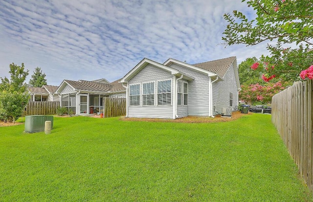 159 Townsend Way, Summerville, SC 29483 - rear view of property featuring a sunroom and a fenced backyard