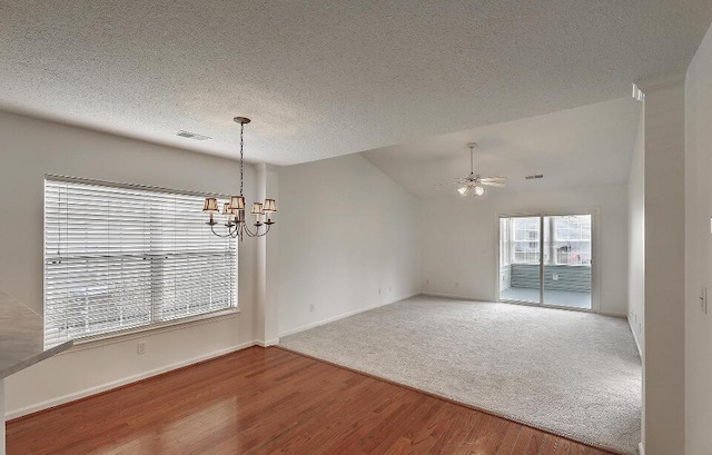 159 Townsend Way, Summerville, SC 29483 - carpeted spare room with a chandelier, wood finished floors, a ceiling fan, a textured ceiling, and vaulted ceiling
