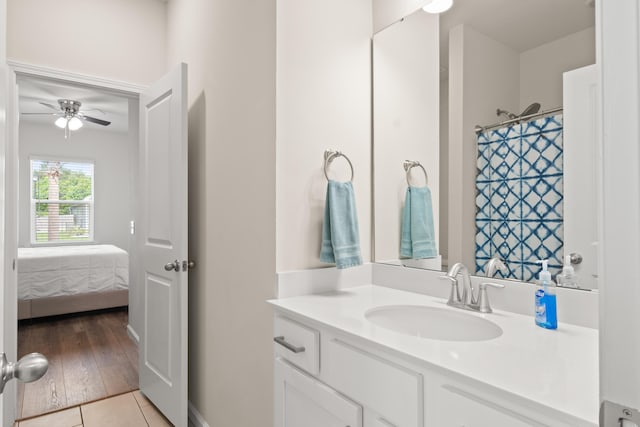 215 Cypress Plantation Rd, Moncks Corner, SC 29461 - ensuite bathroom with vanity, tile patterned flooring, and a ceiling fan