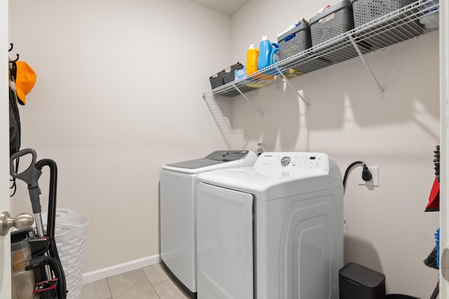 215 Cypress Plantation Rd, Moncks Corner, SC 29461 - laundry area with independent washer and dryer, light tile patterned floors, and baseboards