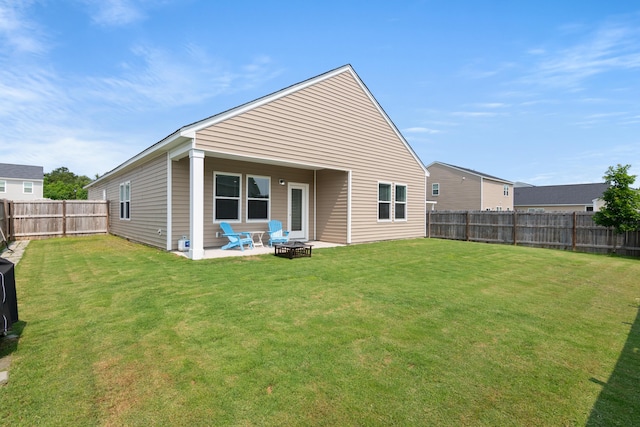 215 Cypress Plantation Rd, Moncks Corner, SC 29461 - rear view of property with a fire pit and a patio area