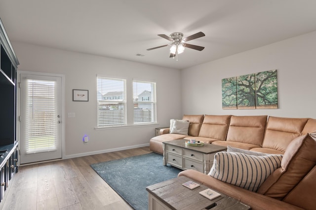 215 Cypress Plantation Rd, Moncks Corner, SC 29461 - living area featuring a ceiling fan, light wood-style flooring, and baseboards