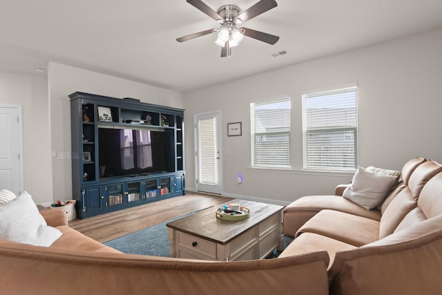 215 Cypress Plantation Rd, Moncks Corner, SC 29461 - living room featuring a ceiling fan, wood finished floors, and baseboards