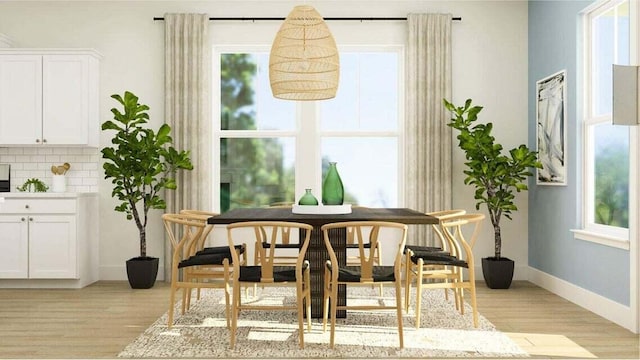 sitting room featuring light hardwood / wood-style floors