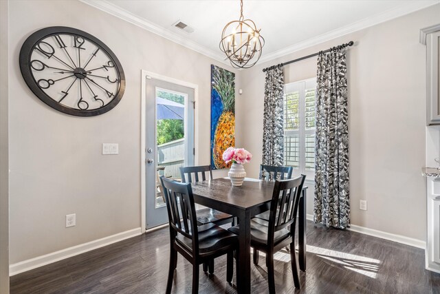 dining space featuring plenty of natural light, visible vents, dark wood-type flooring, and ornamental molding