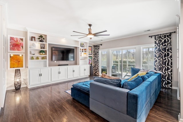 living room featuring ornamental molding, dark wood-style flooring, and visible vents