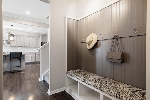 mudroom with ornamental molding, dark wood-style flooring, recessed lighting, and baseboards