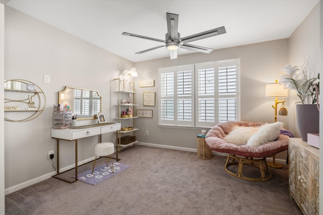 interior space with baseboards and a ceiling fan