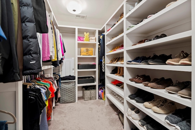 walk in closet with carpet and visible vents