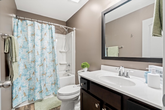 full bath featuring toilet, vanity, and shower / bathtub combination with curtain