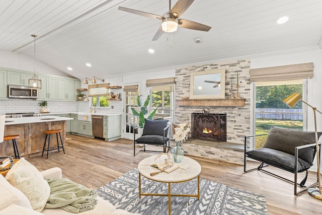 living room featuring light hardwood / wood-style floors, lofted ceiling, a fireplace, and wooden ceiling