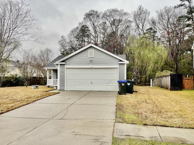 view of side of home with a lawn, driveway, and fence