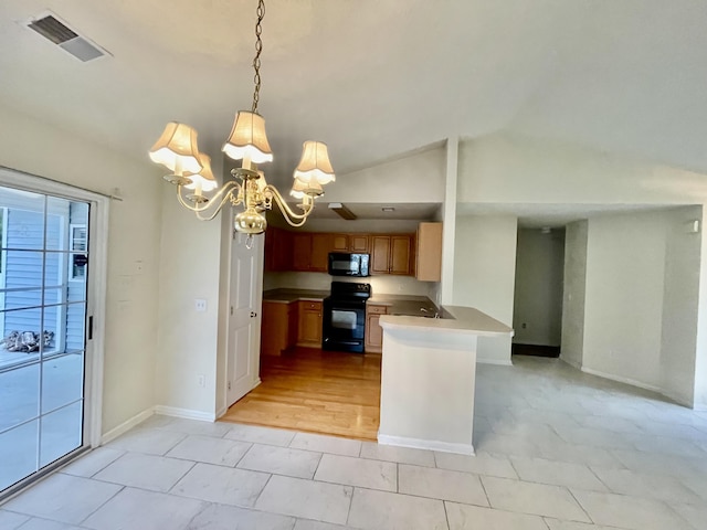 kitchen featuring visible vents, lofted ceiling, black appliances, light countertops, and a chandelier