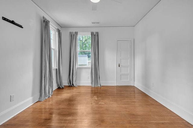 2122 Tugaloo Ave Unit 2120, Columbia, SC 29205 - spare room featuring wood finished floors, a ceiling fan, and baseboards
