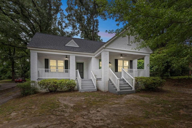 2122 Tugaloo Ave Unit 2120, Columbia, SC 29205 - view of front facade featuring covered porch, brick siding, roof with shingles, and ceiling fan