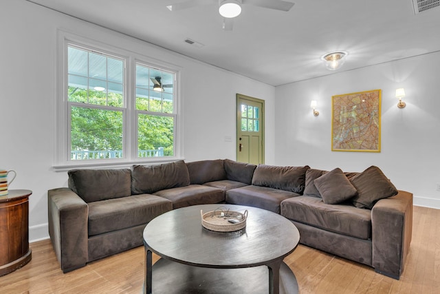 2122 Tugaloo Ave Unit 2120, Columbia, SC 29205 - living room with light wood finished floors, a ceiling fan, and baseboards