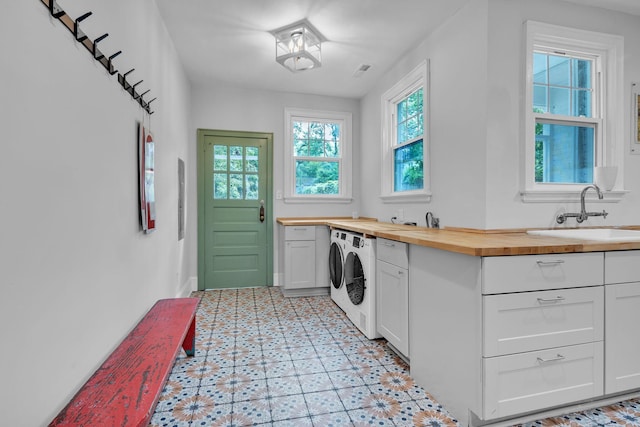 2122 Tugaloo Ave Unit 2120, Columbia, SC 29205 - laundry area with a sink, light floors, and washer and dryer