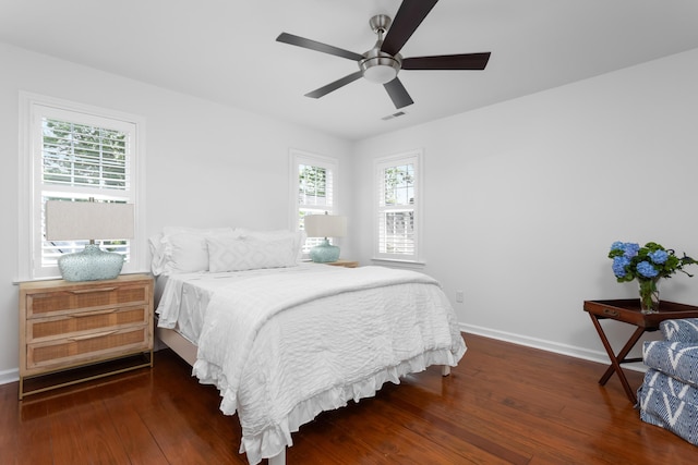 1514 Village Sq, Mount Pleasant, SC 29464 - bedroom with wood-type flooring, baseboards, and ceiling fan