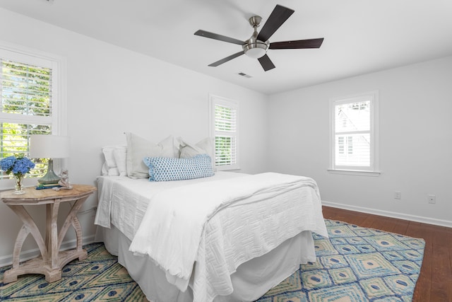 1514 Village Sq, Mount Pleasant, SC 29464 - bedroom with wood finished floors, baseboards, and a ceiling fan