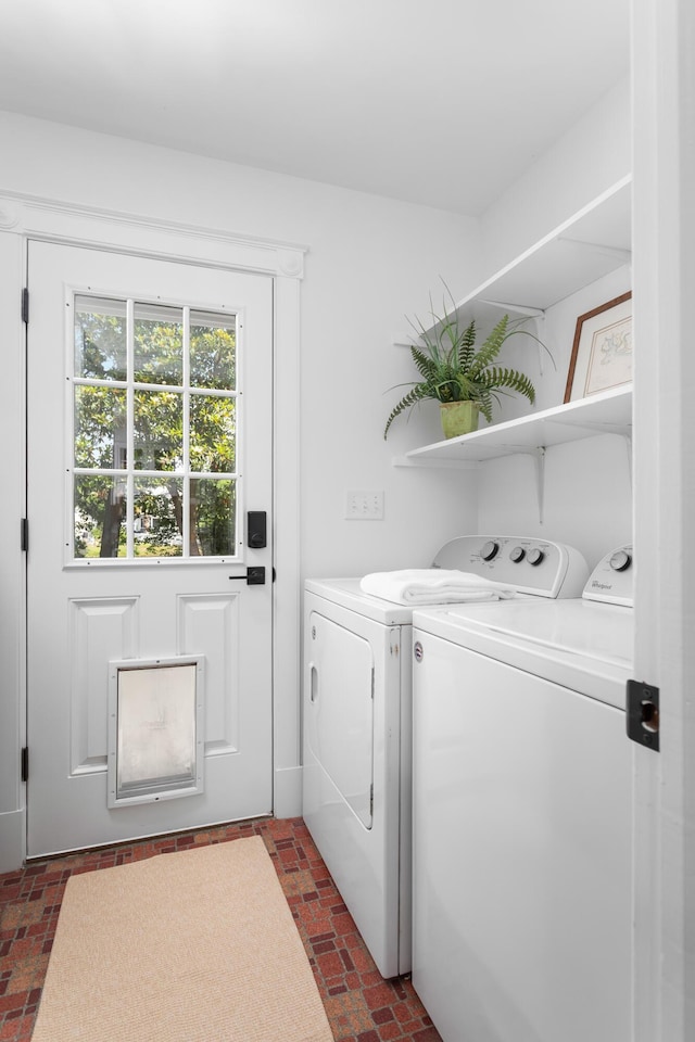 1514 Village Sq, Mount Pleasant, SC 29464 - washroom with washer and clothes dryer and brick floors