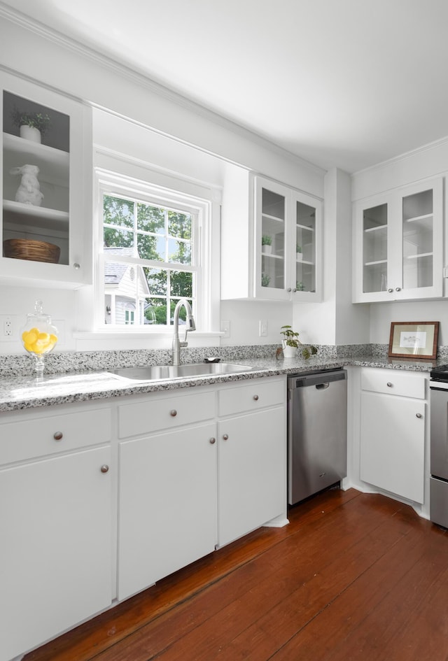1514 Village Sq, Mount Pleasant, SC 29464 - kitchen with dishwasher, a sink, white cabinetry, dark wood-style flooring, and stove