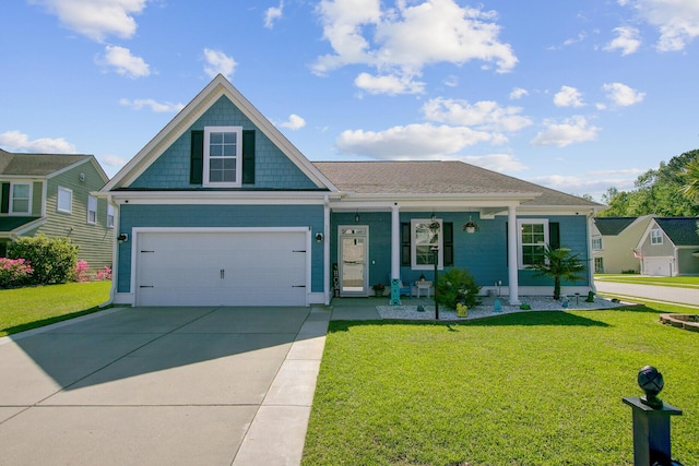 3801 Canary Ct, North Charleston, SC 29420 - view of front of property featuring a front yard, covered porch, driveway, and an attached garage