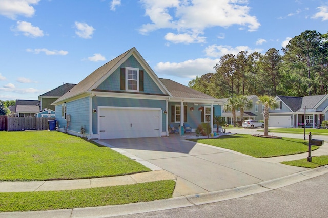 3801 Canary Ct, North Charleston, SC 29420 - view of front of house featuring driveway, an attached garage, and covered porch