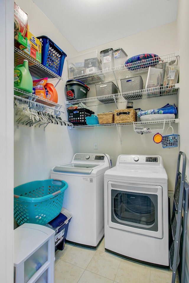3801 Canary Ct, North Charleston, SC 29420 - laundry room featuring washer and dryer and tile patterned floors
