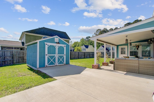 3801 Canary Ct, North Charleston, SC 29420 - view of patio / terrace featuring a storage unit, an outdoor living space, and an outbuilding