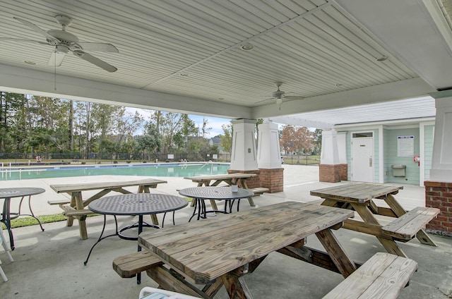3801 Canary Ct, North Charleston, SC 29420 - view of patio featuring ceiling fan, a community pool, and fence