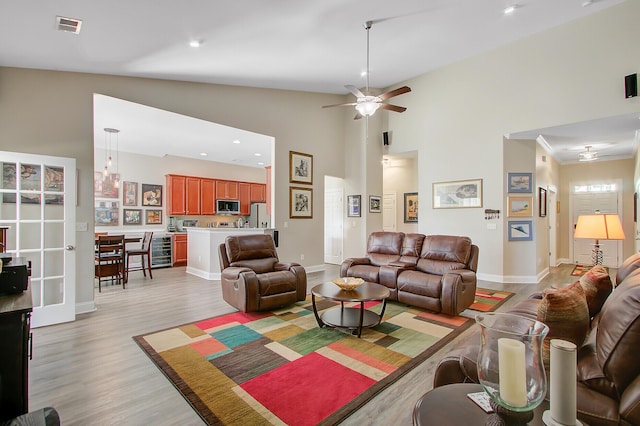 3801 Canary Ct, North Charleston, SC 29420 - living area with light wood finished floors, beverage cooler, recessed lighting, baseboards, and a ceiling fan