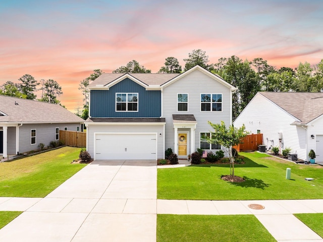 141 Pine Crest View Dr, Summerville, SC 29486 - traditional home with concrete driveway, an attached garage, central AC, and board and batten siding