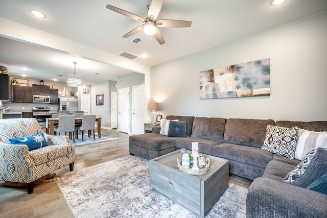 141 Pine Crest View Dr, Summerville, SC 29486 - living area with light wood-style flooring, a ceiling fan, recessed lighting, and baseboards