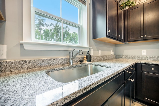 141 Pine Crest View Dr, Summerville, SC 29486 - kitchen featuring a sink, dark brown cabinets, and light stone counters