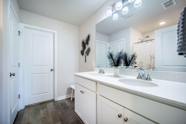 141 Pine Crest View Dr, Summerville, SC 29486 - bathroom featuring double vanity, wood finished floors, baseboards, and curtained shower