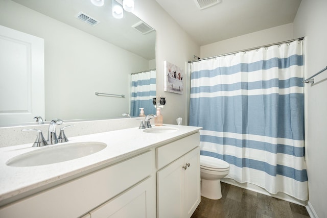 141 Pine Crest View Dr, Summerville, SC 29486 - bathroom with toilet, double vanity, wood finished floors, and a shower with curtain