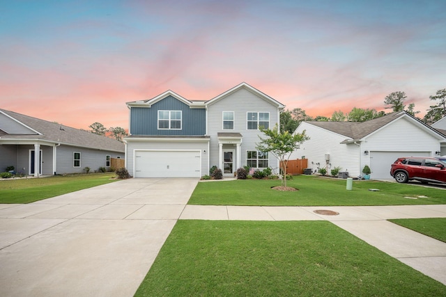 141 Pine Crest View Dr, Summerville, SC 29486 - traditional home with driveway, a front yard, an attached garage, and board and batten siding