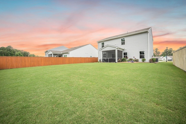 141 Pine Crest View Dr, Summerville, SC 29486 - back of house at dusk with a sunroom