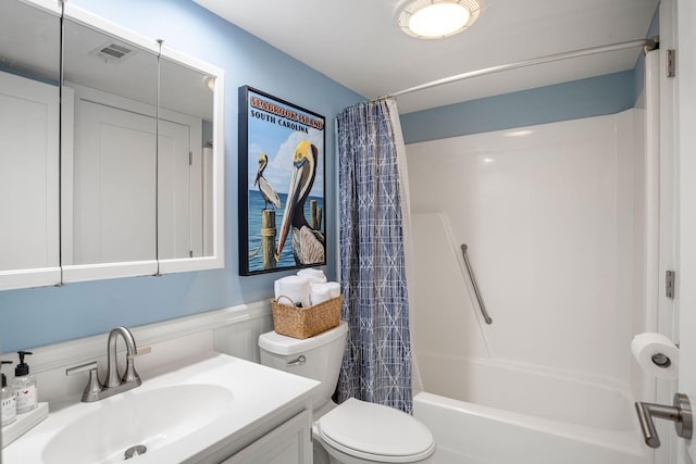 full bathroom featuring visible vents, toilet, vanity, and shower / bath combination with curtain