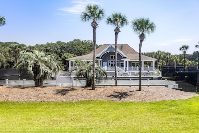 exterior space featuring a yard and fence