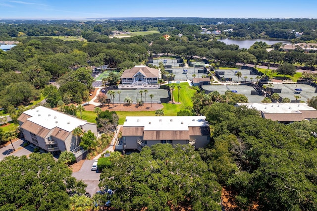 aerial view with a view of trees and a water view