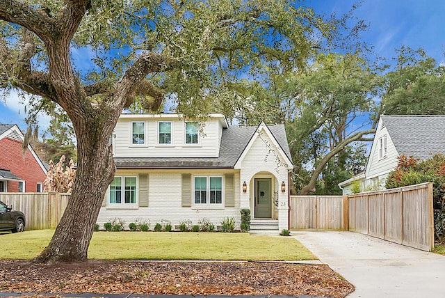 view of front of home with a front lawn