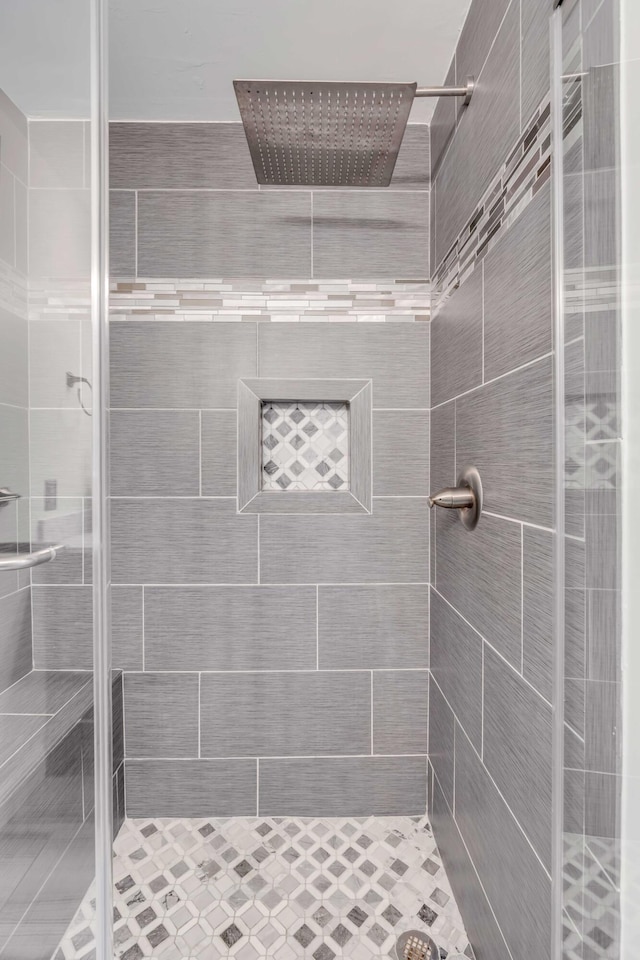 bathroom featuring a stall shower