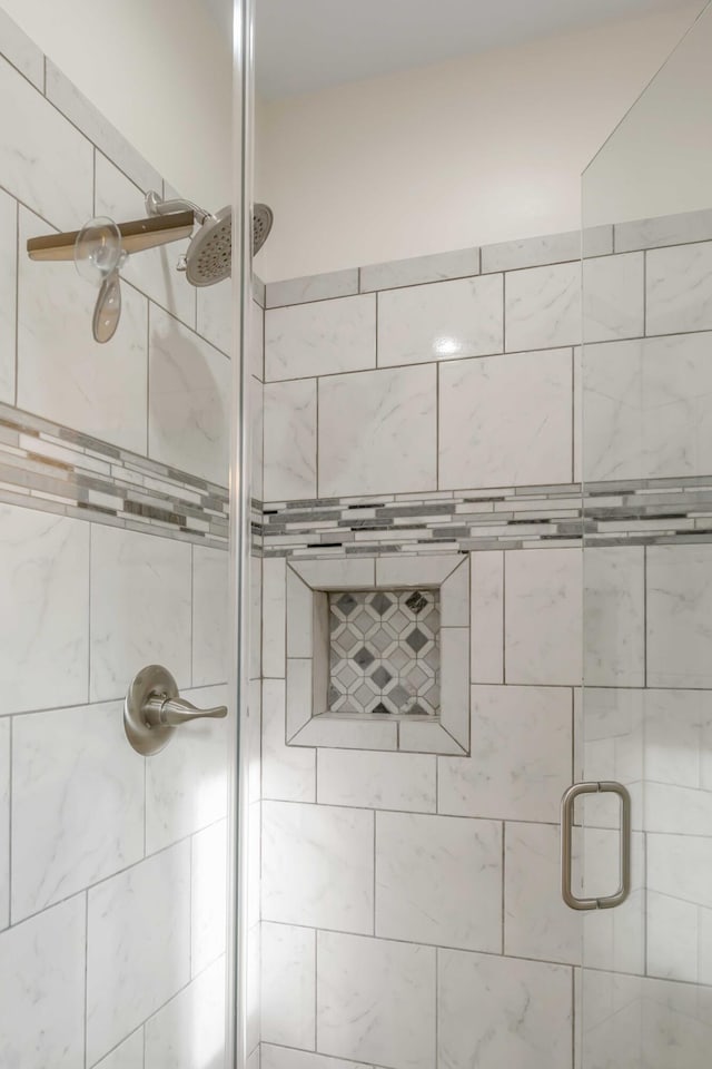 interior space with a stall shower