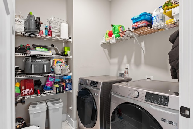 washroom featuring separate washer and dryer