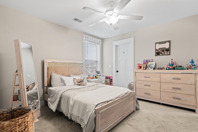 carpeted bedroom with ceiling fan