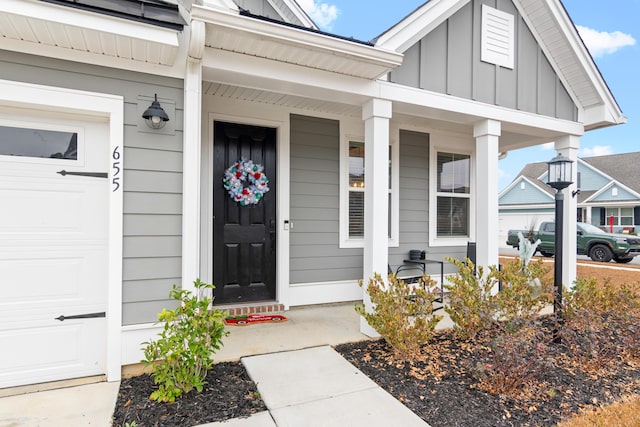 doorway to property with covered porch